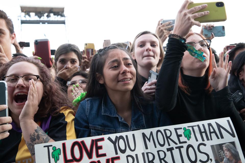 A fan cries as she waits to watch US singer-songwriter Billie Eilish perform at the Austin City Limits (ACL) Music Festival on October 12, 2019 at Zilker Park in Austin, Texas. (Photo by SUZANNE CORDEIRO / AFP) (Photo by SUZANNE CORDEIRO/AFP via Getty Images)