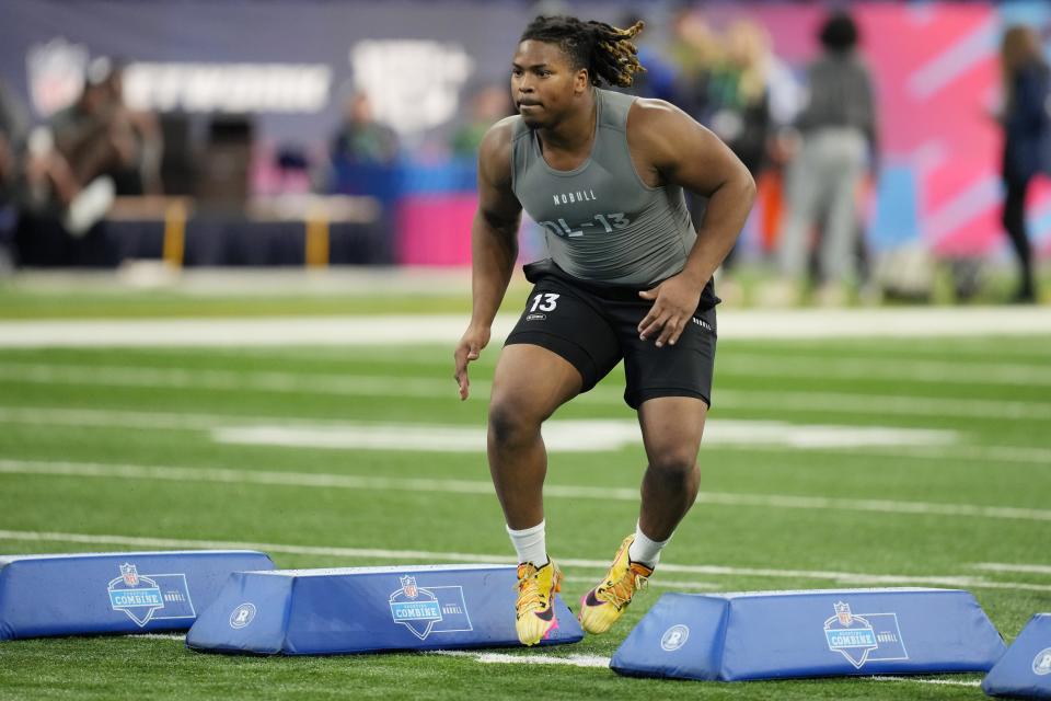 Feb 29, 2024; Indianapolis, IN, USA; Michigan defensive lineman Kris Jenkins (DL13) works out during the 2024 NFL Combine at Lucas Oil Stadium. Mandatory Credit: Kirby Lee-USA TODAY Sports