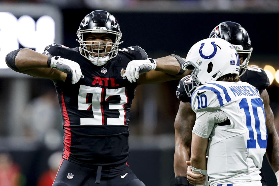 Atlanta Falcons defensive tackle Calais Campbell (93) celebrates sacking Indianapolis Colts quarterback Gardner Minshew (10) during the second half of an NFL football game, Sunday, Dec. 24, 2023, in Atlanta. (AP Photo/Alex Slitz)