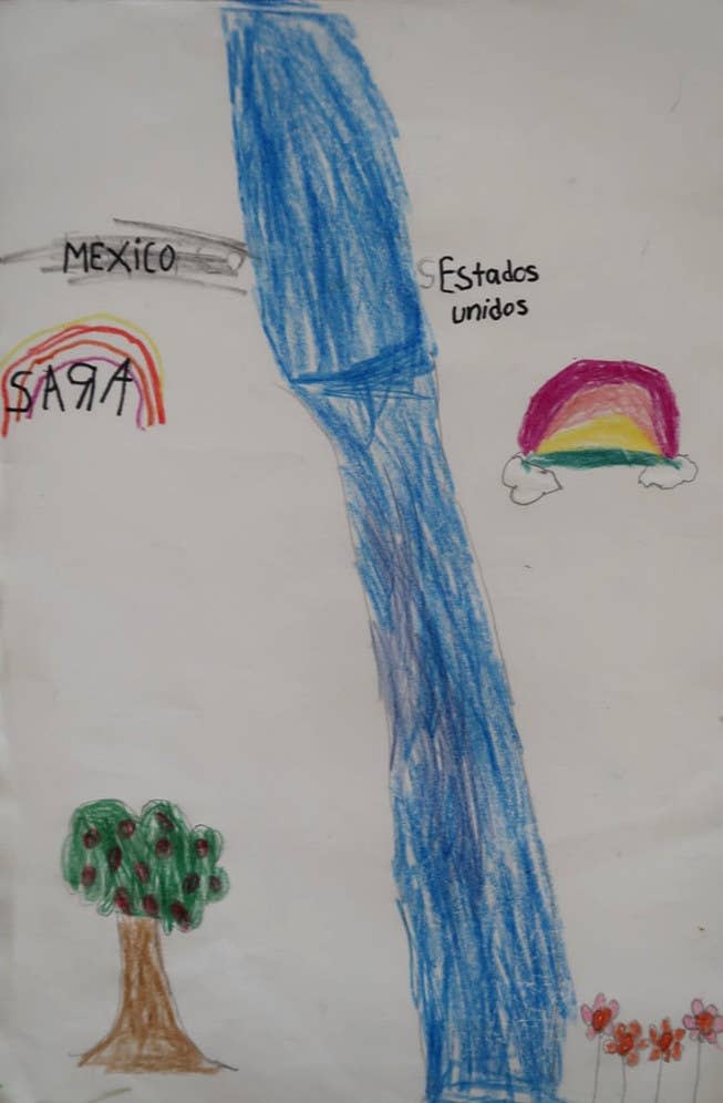 A child's drawing of the US–Mexico border shows rainbows on both sides