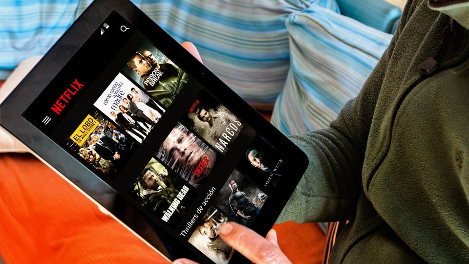 Netflix app on tablet screen. Netflix is an international leading subscription service for watching TV episodes and movies.