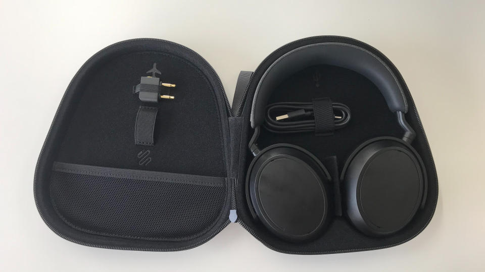 Sennheiser Momentum 4 Wireless in case on white background