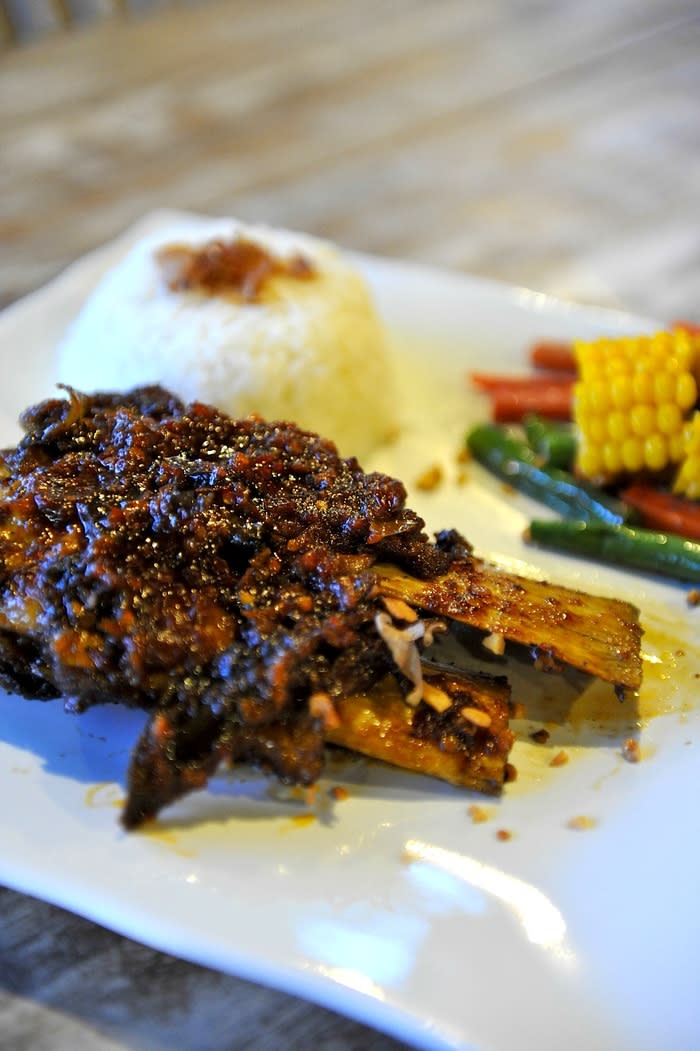 Main offering: Grilled ribs with Indonesian spices is the main offering in Rumah Iga 7 Jari. (