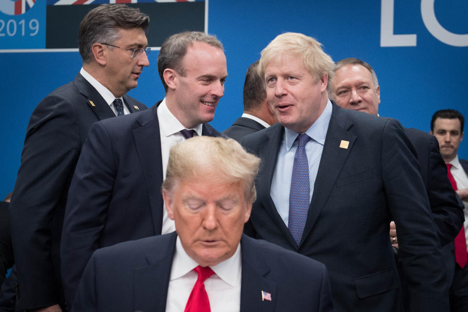 US President Donald Trump (front) with Foreign Secretary Dominic Raab (centre left) snd Prime Minister Boris Johnson(centre right) during the annual Nato heads of government summit at The Grove hotel in Watford, Hertfordshire.