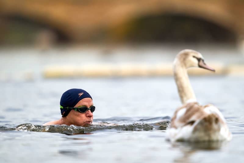 Open water bathing has been praised as a way to improve wellbeing in the last few years, with emerging evidence that it can have a positive impact on mental health, experts say. John Walton/PA Wire/dpa