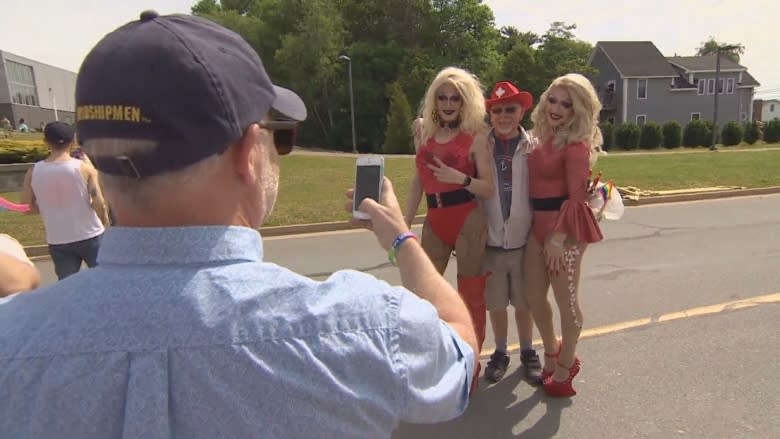 Drag queens walk in Liverpool parade after outpouring of support