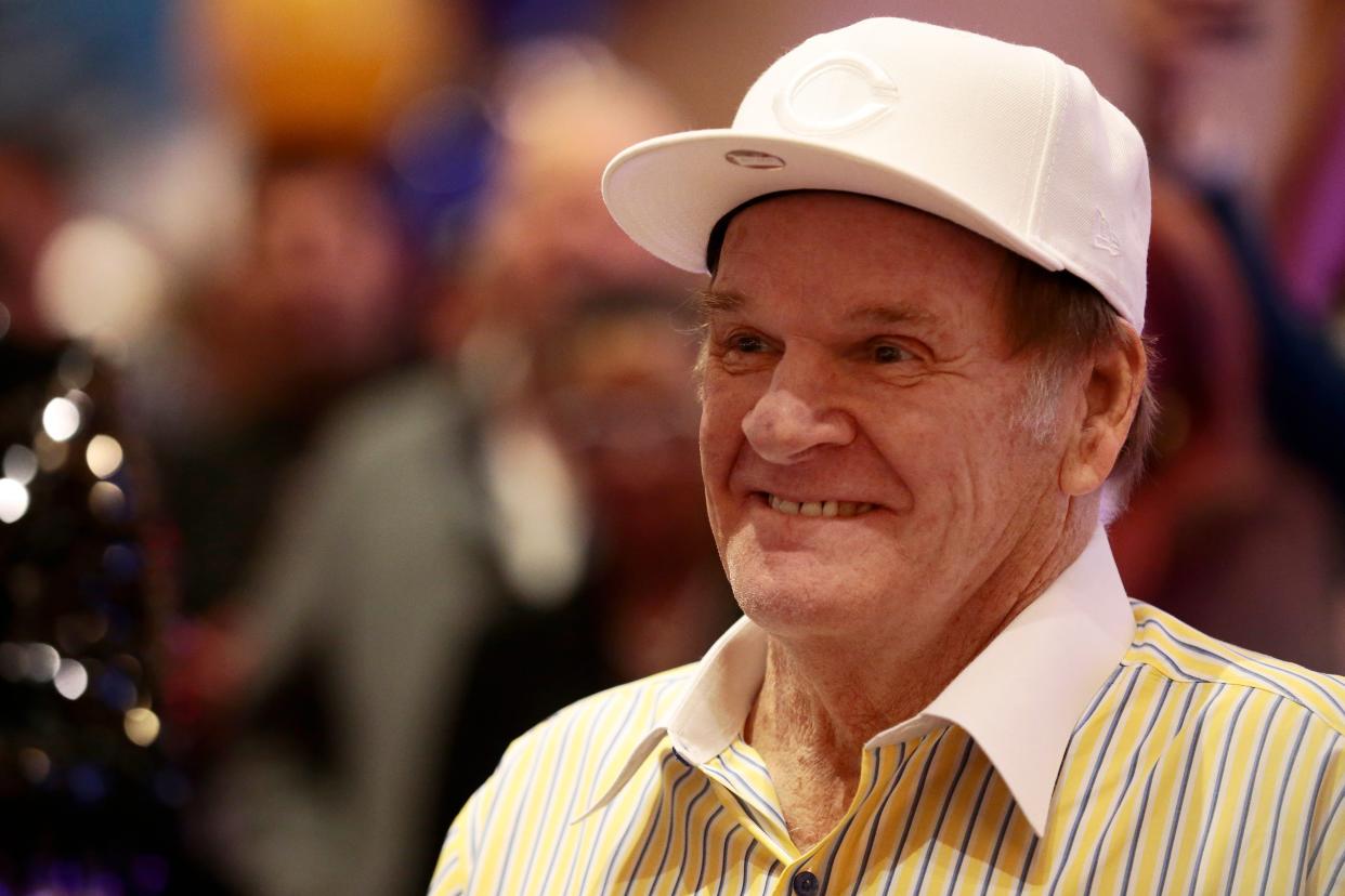 Former Cincinnati Red Pete Rose smiles as he places the inaugural bet on a hand of black jack during the grand opening of the newly rebranded Hard Rock Casino in downtown Cincinnati on Friday, Oct. 29, 2021.

Hard Rock Casino Cincinnati Grand Opening