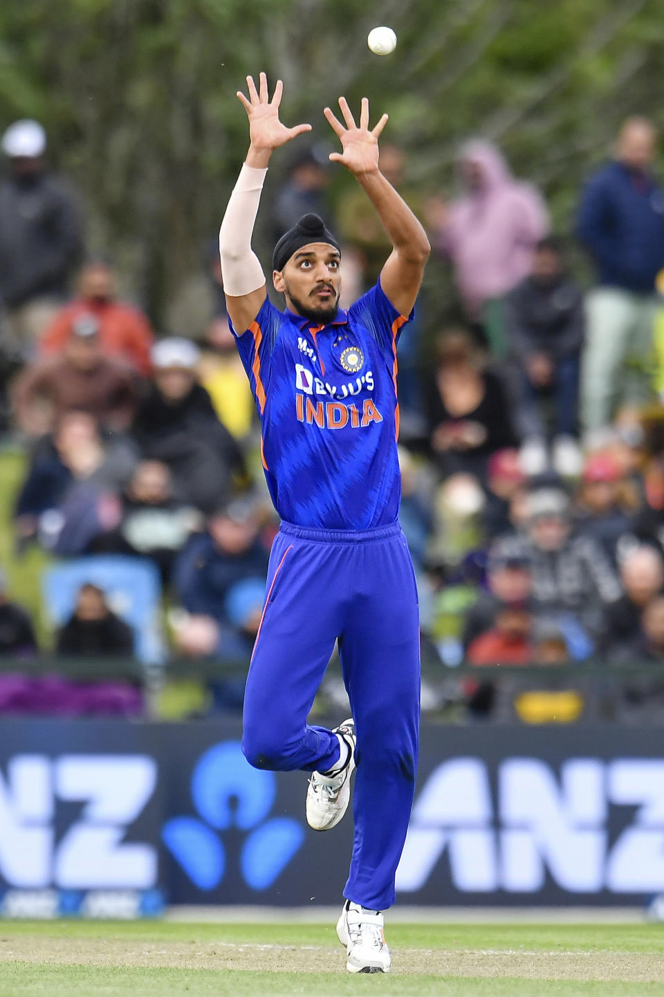 Arshdeep Singh of India fields the ball during the one day cricket international between India and New Zealand at Hagley Oval, in Christchurch, New Zealand, Wednesday, Nov. 30, 2022. (John Davidson /Photosport via AP)