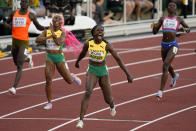Shericka Jackson, of Jamaica, wins the final of the women's 200-meter run ahead of Shelly-Ann Fraser-Pryce, of Jamaica, at the World Athletics Championships on Thursday, July 21, 2022, in Eugene, Ore. (AP Photo/Gregory Bull)