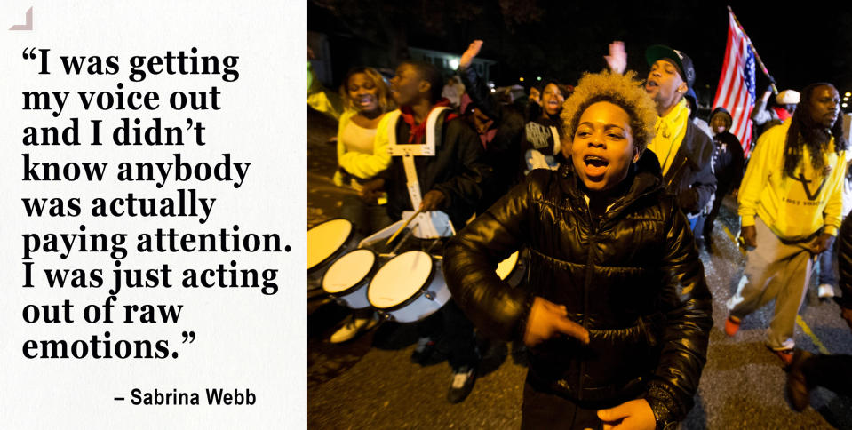 Sabrina Webb, a cousin of Michael Brown, leads a protest near the site where the black 18-year-old was shot and killed by a white police officer in Ferguson. (Photo: David Goldman/AP)