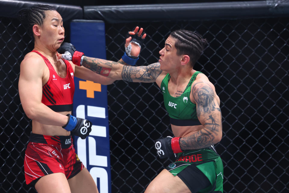 May 6, 2023; Newark, New Jersey, USA; Jessica Andrade (red gloves) fights Yan Xiaonan (blue gloves) during UFC 288 at Prudential Center. Mandatory Credit: Ed Mulholland-USA TODAY Sports