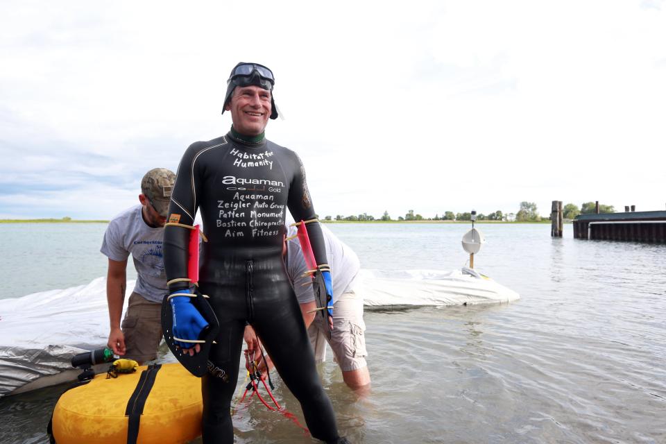Jim Dreyer swam across Lake St. Clair from Detroit to Harsens Island in Algonac on Aug. 5, 2013.