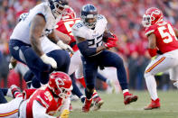 Tennessee Titans' Derrick Henry (22) runs during the first half of the NFL AFC Championship football game against the Kansas City Chiefs Sunday, Jan. 19, 2020, in Kansas City, MO. (AP Photo/Jeff Roberson)