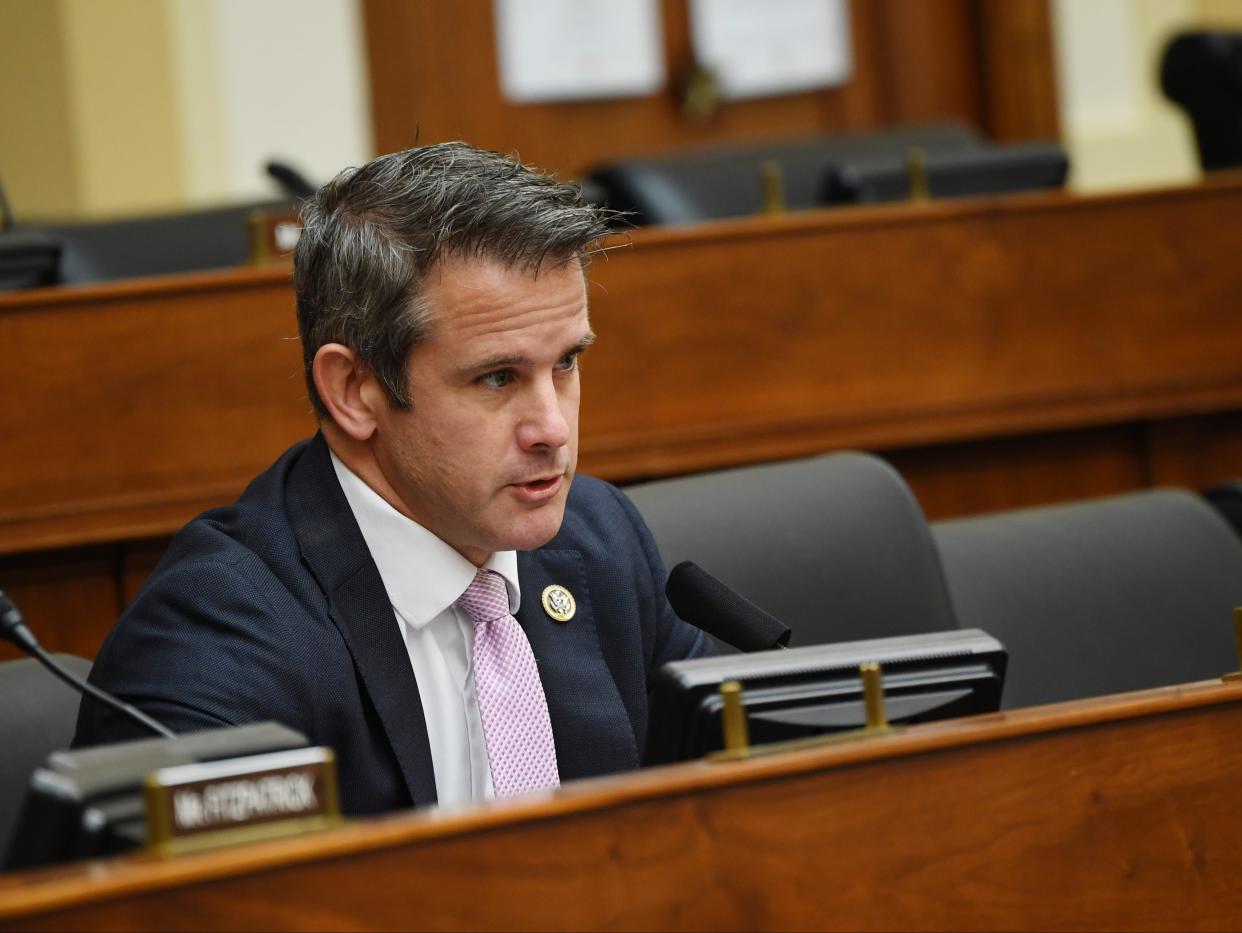 <p>Adam Kinzinger (R-IL) questions witnesses during a House Committee on Foreign Affairs hearing looking into the firing of State Department Inspector General Steven Linick, on Capitol Hill on 16 September 2020 in Washington, DC</p> ((Getty Images))