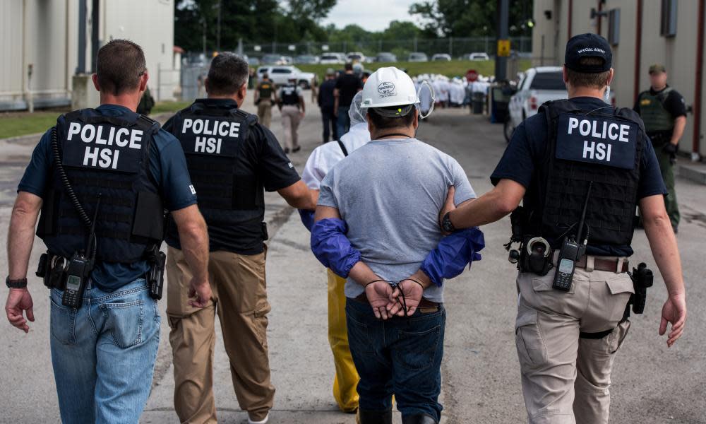 A man is taken away by immigration agents in Ohio. Trump’s rhetoric has given license for citizens to vent their bigotry.