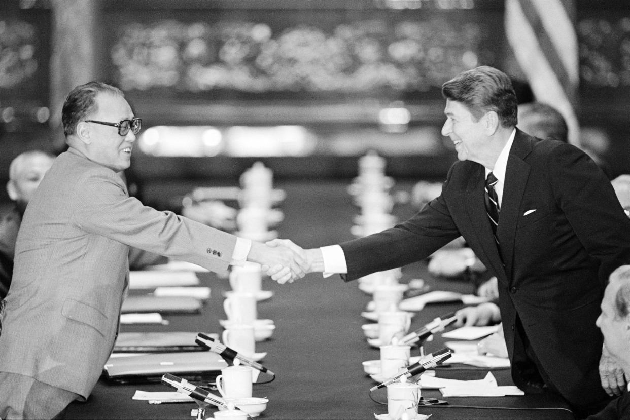 Zhao Ziyang and Ronald Reagan at the conclusion of their meeting at the Great Hall of the People, in Peking, China (Bettmann Archive)
