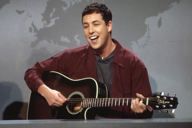 Alan Singer/NBCU Photo Bank/NBCUniversal/Getty Adam Sandler performs 'The Hanukkah Song' on "Weekend Update" on Dec. 3, 1994.