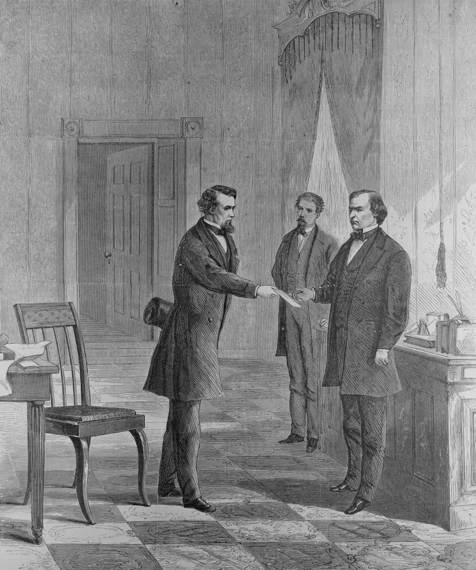 George T. Brown, sergeant-at-arms of the Senate, serves the summons on President Johnson.