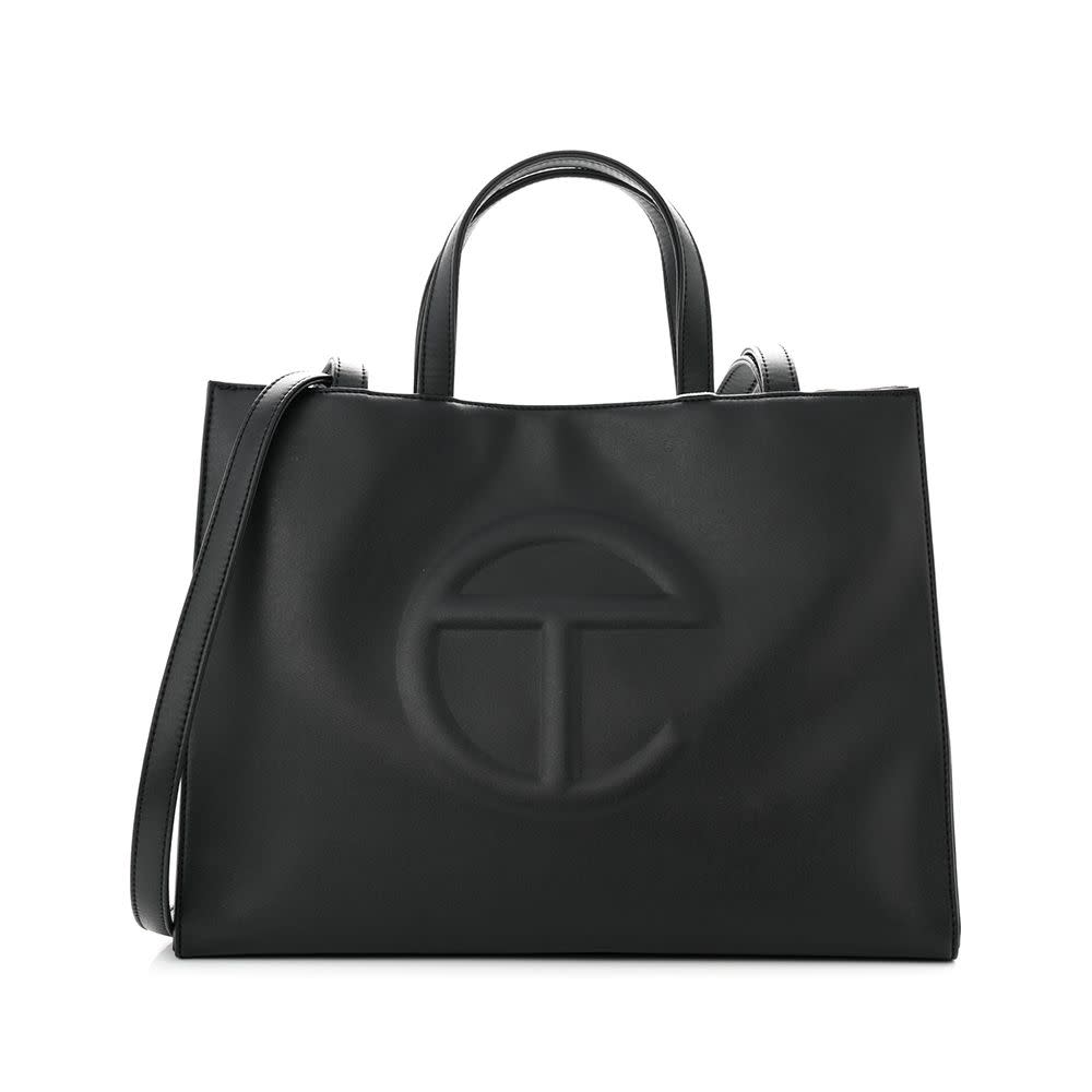 <p><a href="https://go.redirectingat.com?id=74968X1596630&url=https%3A%2F%2Fwww.fashionphile.com%2Fp%2Ftelfar-vegan-leather-medium-shopping-bag-black-1230233&sref=https%3A%2F%2Fwww.elle.com%2Ffashion%2Fshopping%2Fg44592109%2Fbest-designer-bags%2F" rel="nofollow noopener" target="_blank" data-ylk="slk:Shop Now;elm:context_link;itc:0;sec:content-canvas" class="link rapid-noclick-resp">Shop Now</a></p><p>Vegan Leather Medium Shopping Bag Chocolate</p><p>$470.00</p>