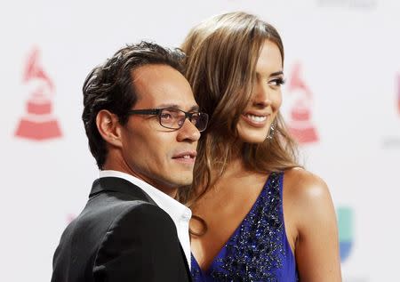 Singer Marc Anthony and his wife Shannon De Lima arrive at the 15th Annual Latin Grammy Awards in Las Vegas, Nevada November 20, 2014. REUTERS/Steve Marcus