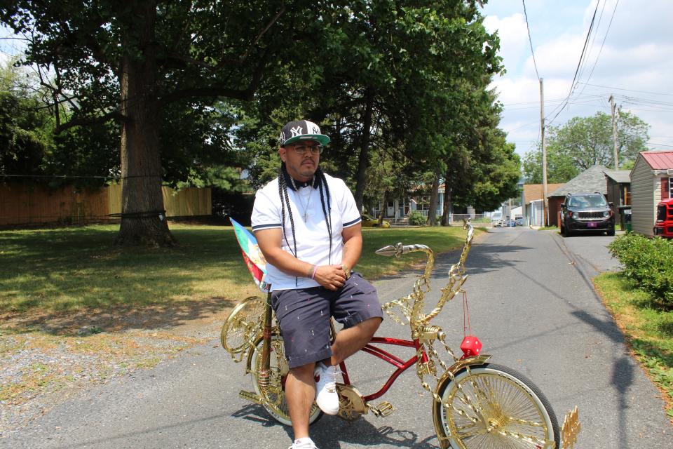 Pedro Cartagena, 31, builds custom made lowrider bikes from his garage, June 13.