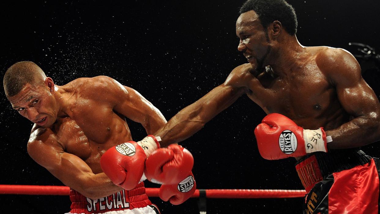 Lovemore Ndou (right) throws a punch at Kell Brook during their WBA International welterweight title fight in Sheffield in June 2011