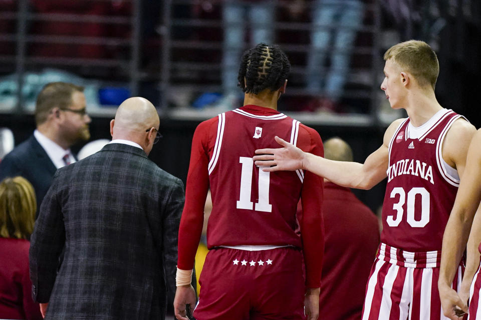 Indiana's CJ Gunn (11) walks off the court after being charged with a technical foul during the second half of the team's NCAA college basketball game against Wisconsin on Friday, Jan. 19, 2024, in Madison, Wis. (AP Photo/Andy Manis)