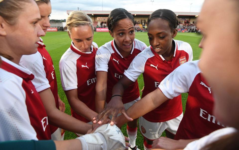 Alex Scott, flanked by Jordan Nobbs and Danielle Carter, with Arsenal in 2017 - GETTY IMAGES