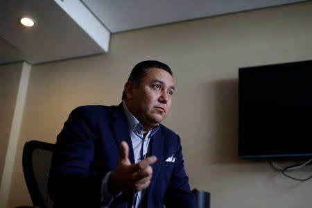 Venezuelan evangelical pastor and presidential pre-candidate Javier Bertucci speaks during an interview with Reuters in Caracas, Venezuela February 21, 2018. REUTERS/Marco Bello