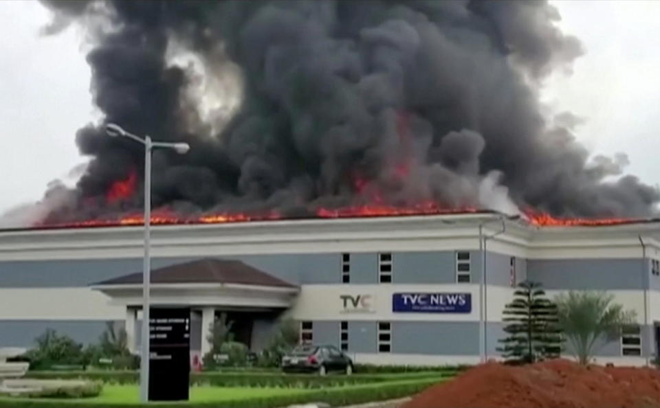 A still image taken from a video obtained by Reuters on October 21, 2020, shows the roof of TVC television station in flames, in Lagos, Nigeria.  / Credit: REUTERS TV