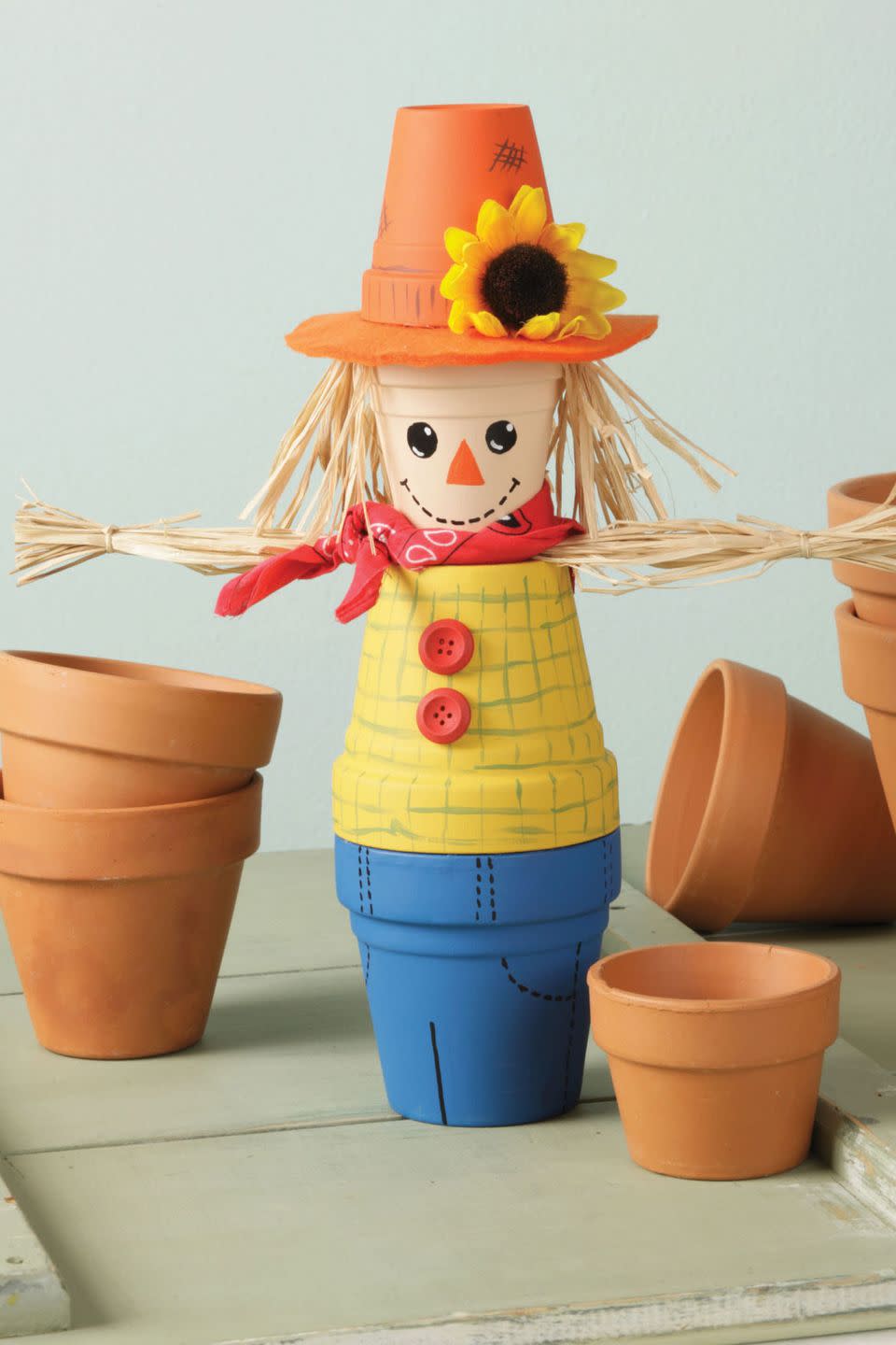 21) Clay Pot Scarecrow Idea