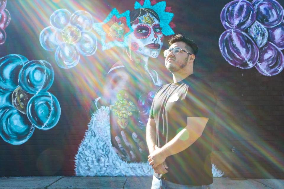 Jose Valentin Ramirez Cardiel stands in front of his mural at Maria’s Mexican Restaurant on South Boulevard. Cardiel, received a $20,00 grant from the city and $3,000 from ASC to create public murals in Charlotte that celebrate Latin culture.