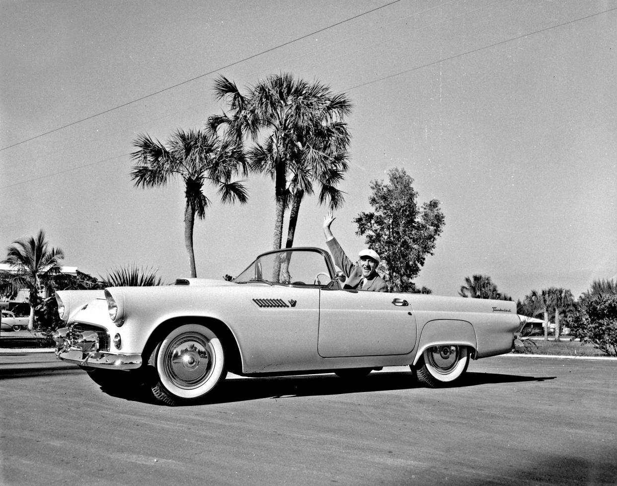 David Lindsay Sr., co-founder, editor and publisher of the Sarasota Herald, waving from his 1955 Thunderbird.