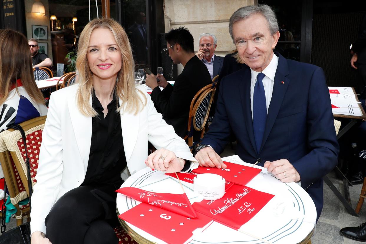 Louis Vuitton's executive vice president Delphine Arnault and Owner of LVMH Luxury Group Bernard Arnault attend the Louis Vuitton Menswear Spring Summer 2020 show as part of Paris Fashion Week on June 20, 2019 in Paris, France.