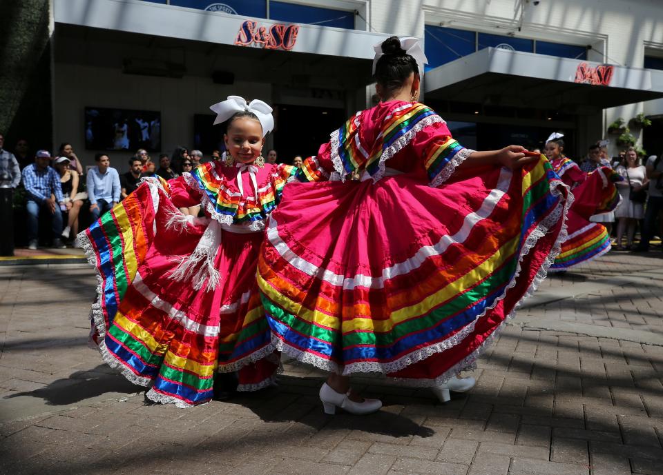 Ballet Folklorico dancers performed during a Cinco de Mayo celebration at Fourth Street Live in Louisville, Ky. on May 8, 2022.  Cinco de Mayo is celebrated on the first Sunday after the Kentucky Derby to avoid conflicting activities.