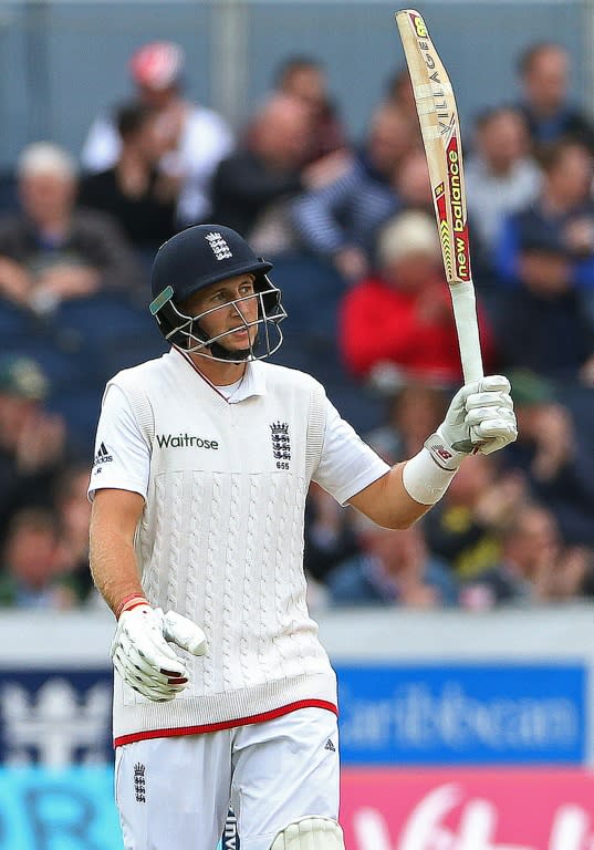 England's Joe Root acknowledges the crowd after reaching his half-century on the first day of the second Test against Sri Lanka in Chester-le-Street, northeast England, on May 27, 2016