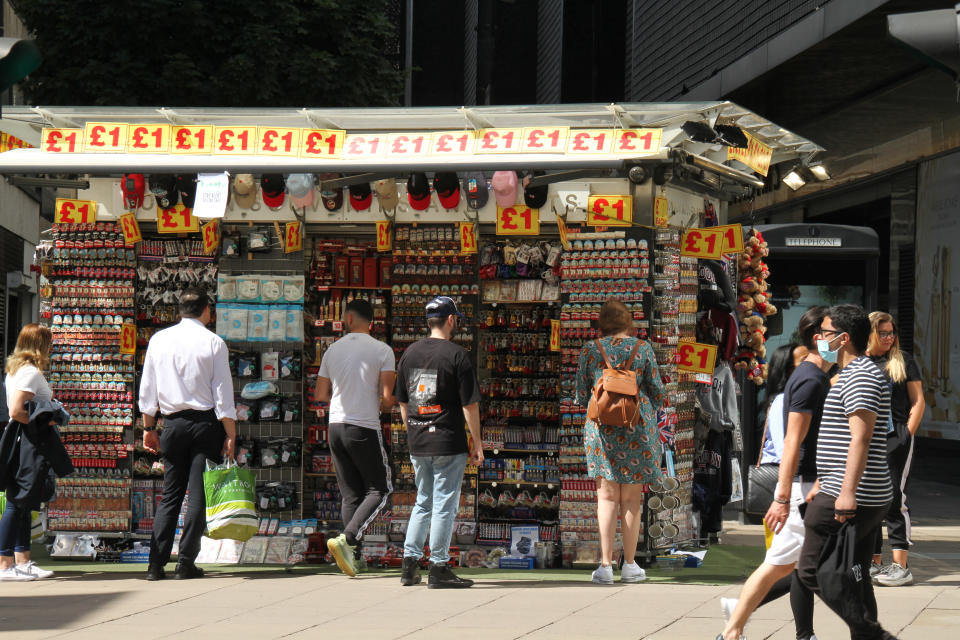  People are seen shopping at a �1 merchandise stall on the Oxford Street.
Londoners have slowly began to go back to 'normal' with shops reopened on Oxford Street. This week the government has advised on the opening of gyms and pools from 11 July. (Photo by David Mbiyu / SOPA Images/Sipa USA) 