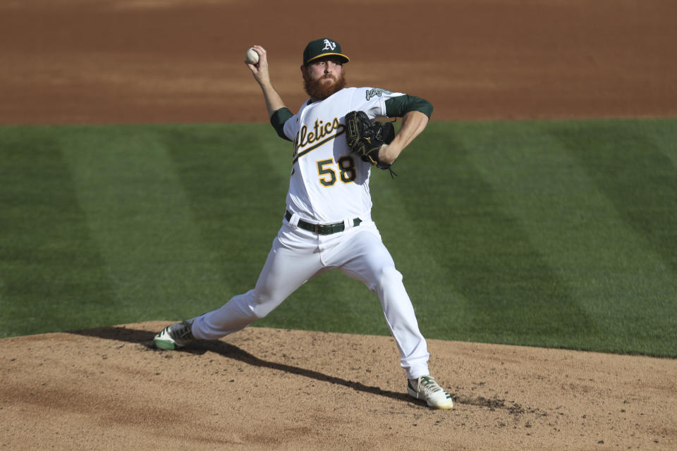 Oakland Athletics' Paul Blackburn pitches against the Seattle Mariners' during the first inning of the second baseball game of a doubleheader in Oakland, Calif., Saturday, Sept. 26, 2020. (AP Photo/Jed Jacobsohn)