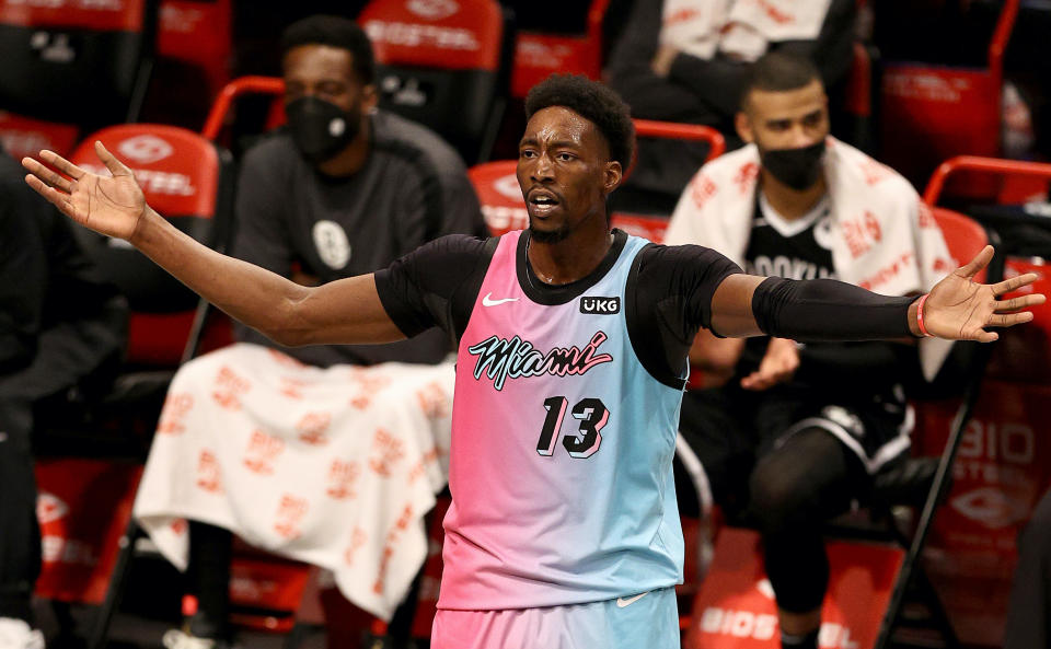 NEW YORK, NEW YORK - JANUARY 23:  Bam Adebayo #13 of the Miami Heat reacts after he thought there should have been a foul against the Brooklyn Nets at Barclays Center on January 23, 2021 in New York City.NOTE TO USER: User expressly acknowledges and agrees that, by downloading and or using this photograph, User is consenting to the terms and conditions of the Getty Images License Agreement. (Photo by Elsa/Getty Images)