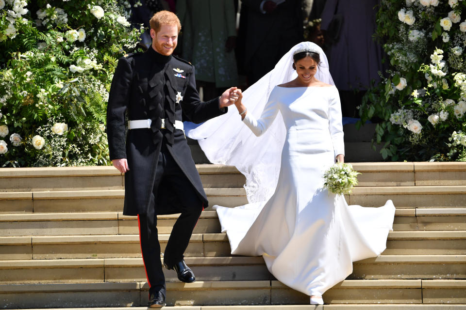 The Duchess of Sussex’s wedding gown featured flowers from all 53 Commonwealth countries, which was inspired by Queen Elizabeth II. Source: Getty