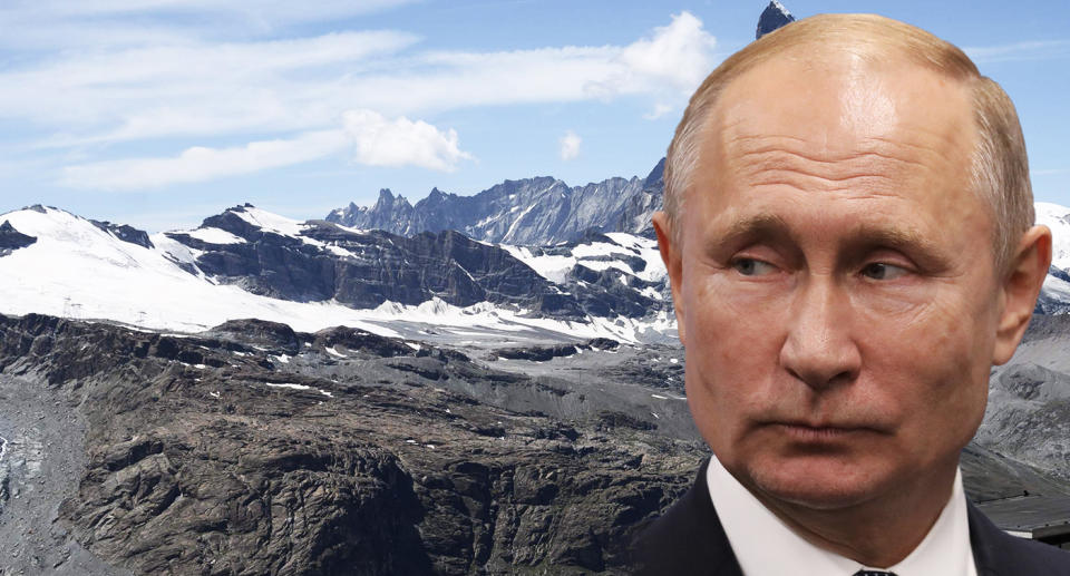 Russian President Vladamir Putin on a background of the Swiss Alps in Switzerland.