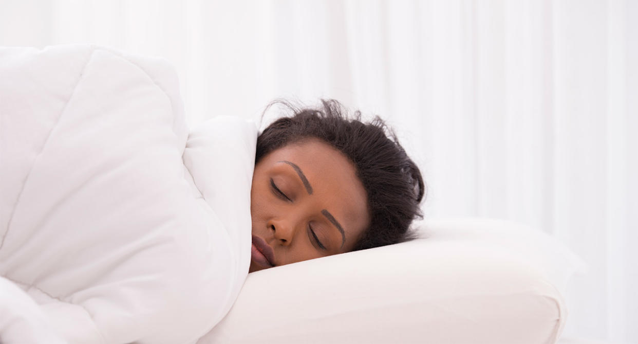 Woman sleeping, representing whether to leave heating on or not. (Getty Images)