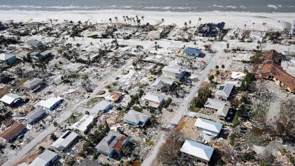 PHOTO: Damaged homes and debris in the aftermath of Hurricane Ian, Sept. 29, 2022, in Fort Myers, Fla. (Wilfredo Lee/AP)