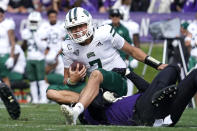 Ohio quarterback Kurtis Rourke, top, is sacked by Northwestern linebacker Khalid Jones during the second half of an NCAA college football game in Evanston, Ill., Saturday, Sept. 25, 2021. Northwestern won 35-6. (AP Photo/Nam Y. Huh)