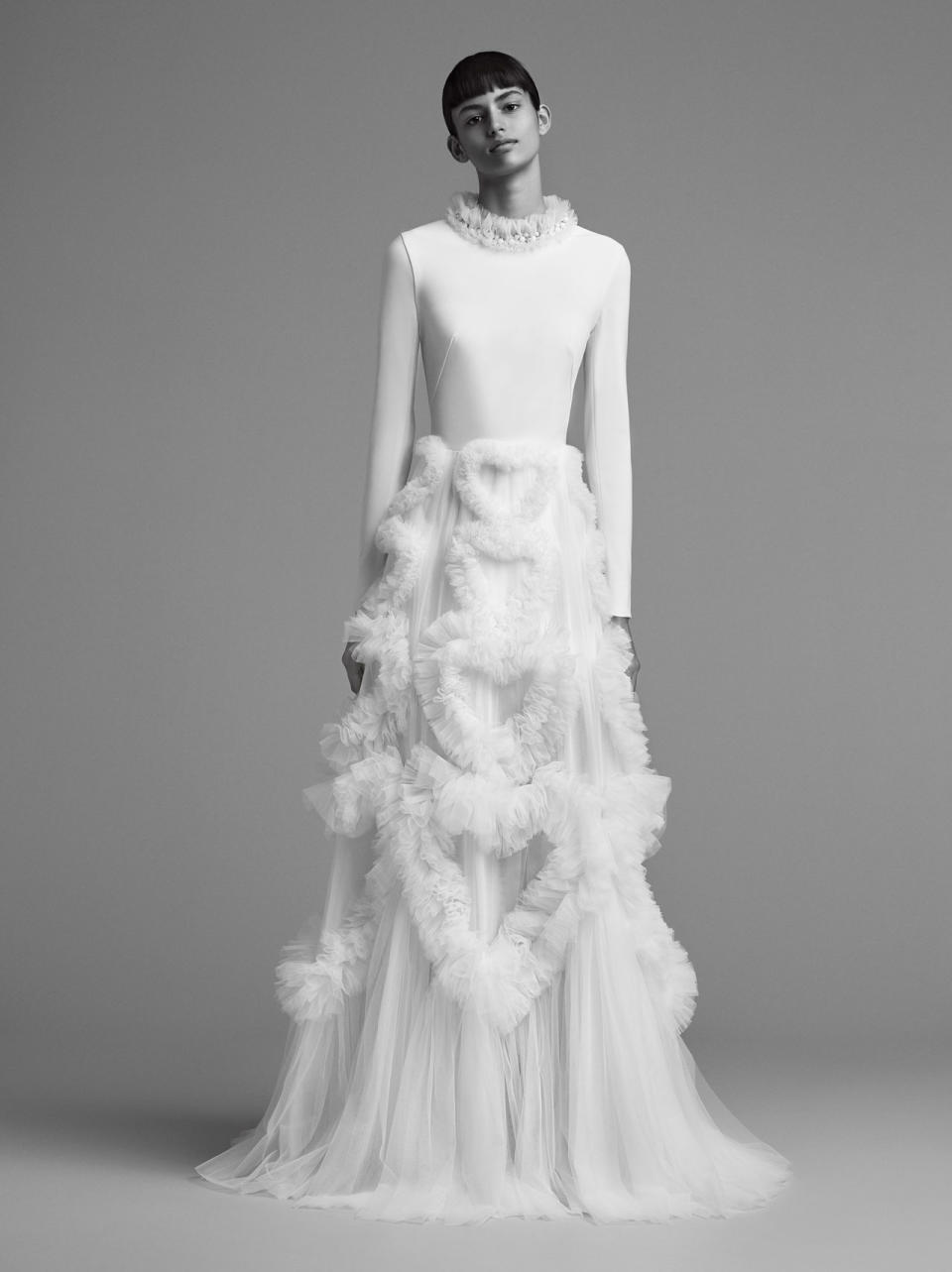 <p>Long-sleeved, tulle skirt gown from the FW18 Viktor & Rolf <a rel="nofollow noopener" href="http://www.viktor-rolf.com/viktorrolf-mariage/" target="_blank" data-ylk="slk:Mariage;elm:context_link;itc:0;sec:content-canvas" class="link ">Mariage</a> collection. (Photo: Marijke Aerden) </p>