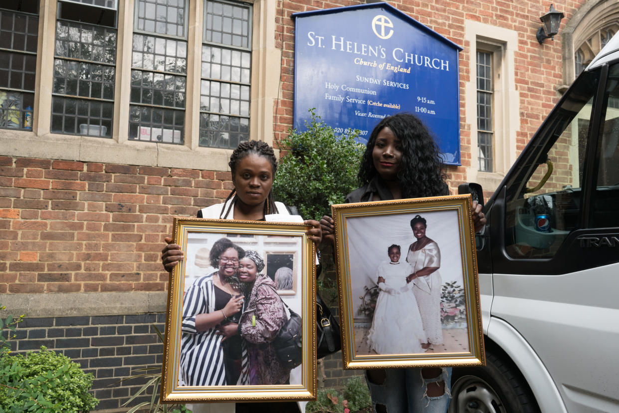 Family of Khadija Saye hold tributes to their lost relative during a memorial after the fire. (PA)