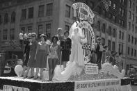 File - Members of the International Ladies' Garment Workers' Union are seen on a Labor Day parade float, Sept. 4, 1961. Labor Day, 2023, is right around the corner. And while many may associate the holiday with major retail sales and end-of summer barbecues, Labor Day's roots in worker-driven organizing feel especially significant this year. (AP Photo/Hans Von Nolde, File)