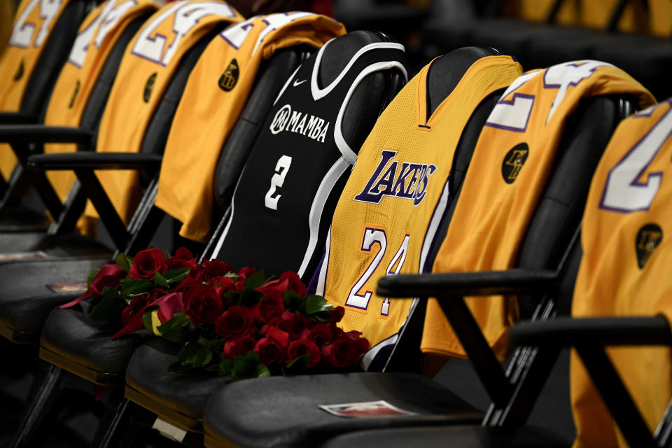 LOS ANGELES, CALIFORNIA - JANUARY 31:  The Los Angeles Lakers honor Kobe Bryant and daughter Gigi by covering the courtside seats they occupied with flowers, Gigi's #2 Mamba jersey and Kobe's #24 jersey before the game against the Portland Trail Blazers at Staples Center on January 31, 2020 in Los Angeles, California. (Photo by Kevork Djansezian/Getty Images)