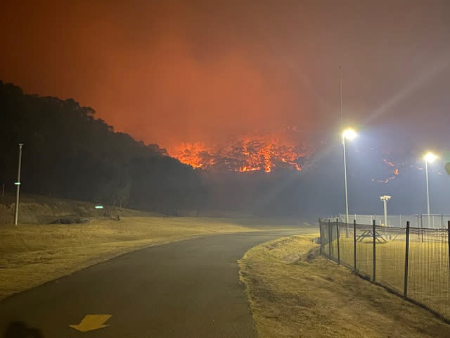 A bushfire burns near the Lithgow Correctional Centre compound in Marrangaroo