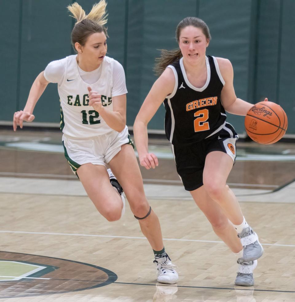 Green's Mallory Oddo brings the ball down the court against GlenOak’s Kiley Dyrlund on Wednesday, Jan. 5, 2022.